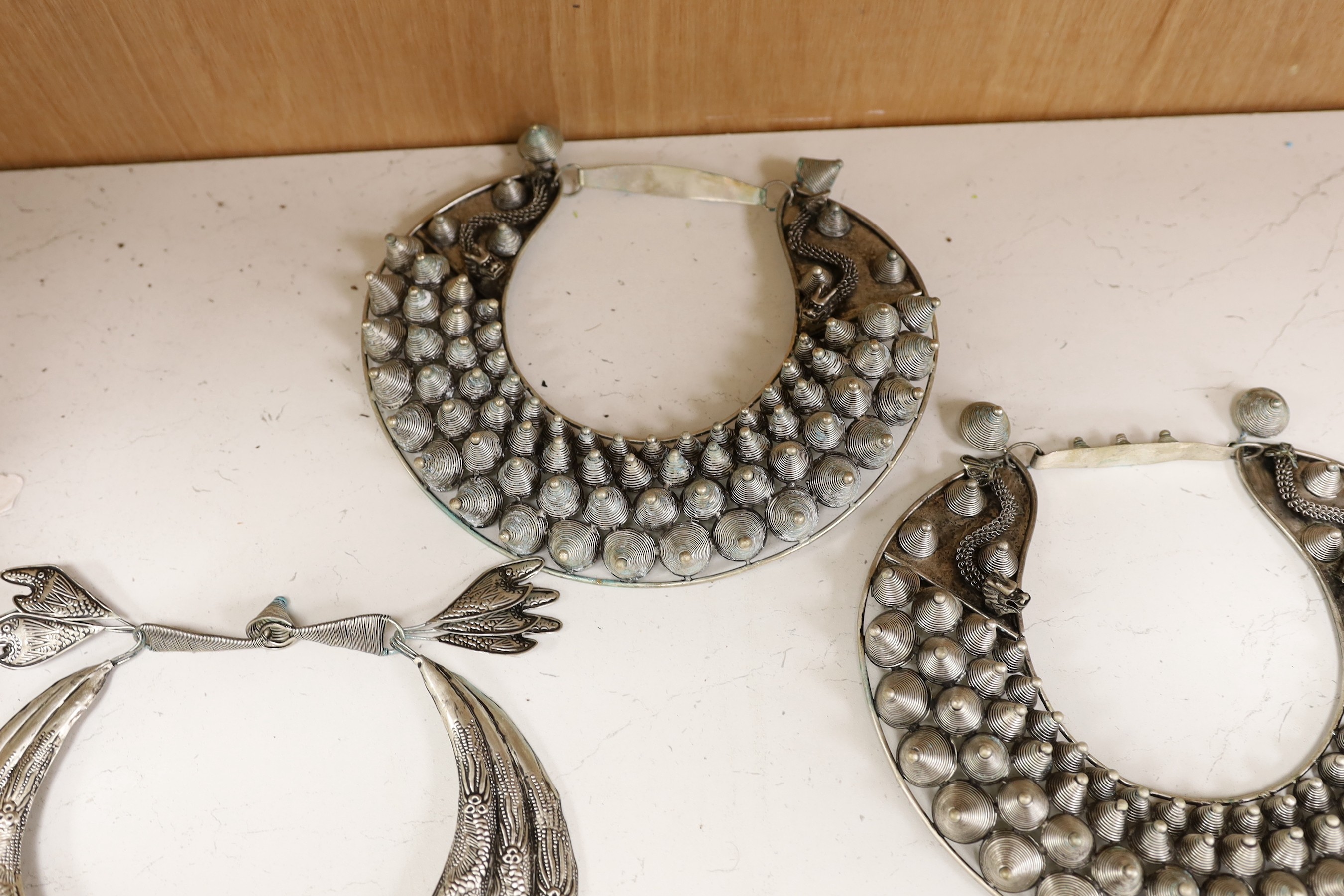Six various south East Asian white metal collars